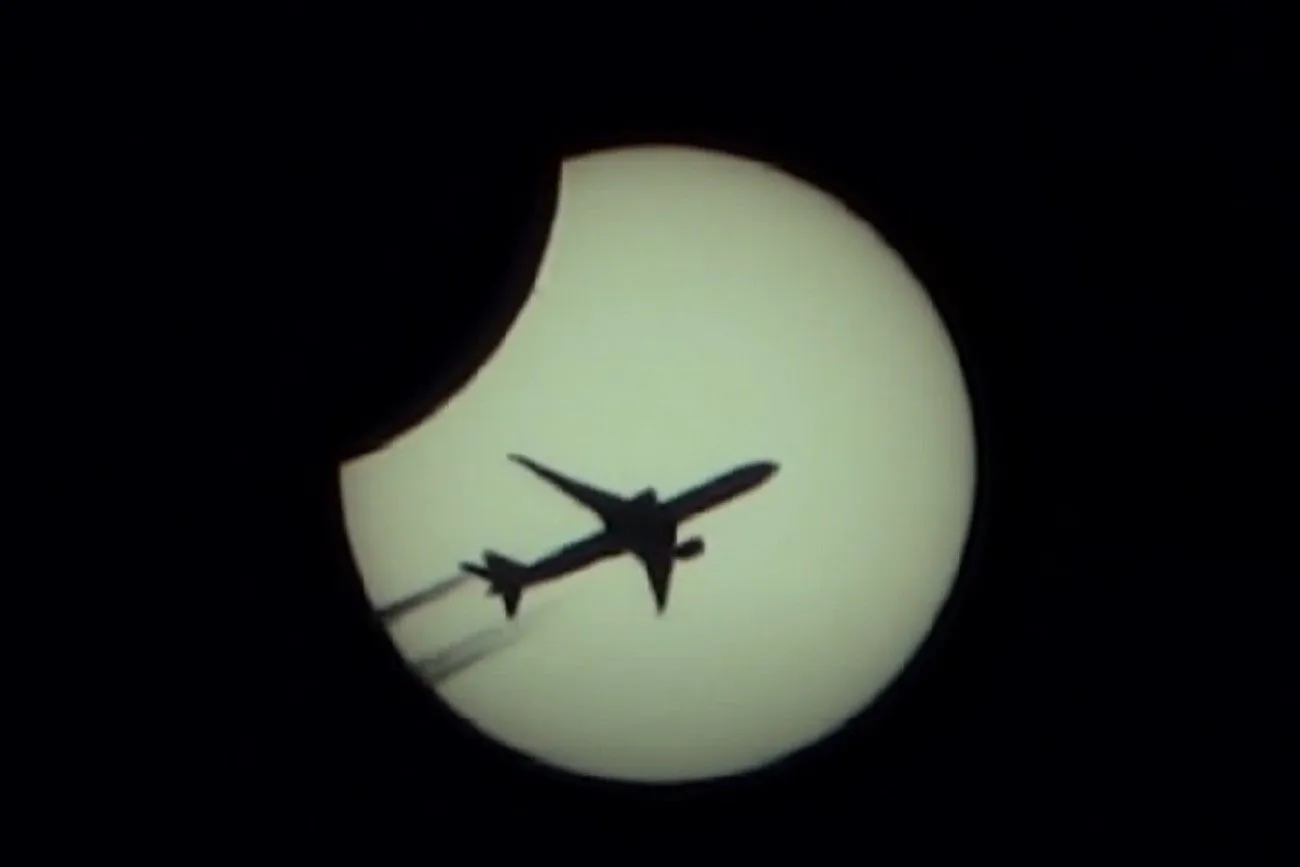 12. A Solar Eclipse is Passed by an Airplane.jpg?format=webp